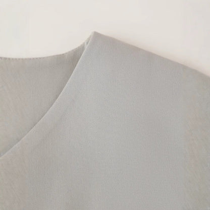 Langarm-Damenjacke aus hellgrauem, monochromem Stoff mit Knopfdetails – elegante und vielseitige Jacke für den Alltag und formelle Anlässe 4